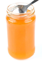 Cuiller dans le pot de confiture