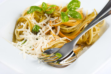 spaghetti pasta with fresh basil and grated parmesan