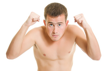 Fototapeta premium A man compresses his fists