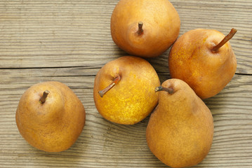 pears on wooden table, top view