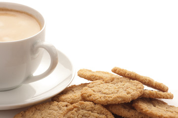 cup of coffee and oatmeal cookies