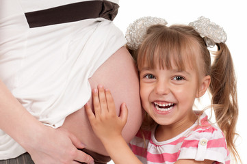 Pregnant woman with her daughter