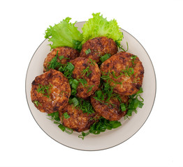Cutlets on salad leaves