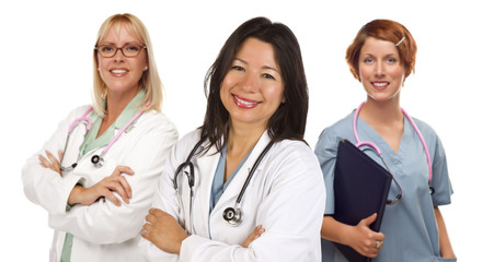 Fototapeta premium Three Female Doctors or Nurses on White