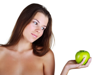 Beautiful girl holds in a hand green apple