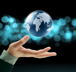earth globe in his hands
