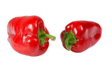 Red fresh bell peppers on a white background