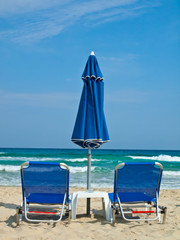 Sunbeds and umbrella at Paradise Beach Thasos