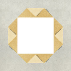 Fototapeta premium Hole ripped in recycled paper craft on white background