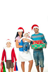 Happy family with Christmas gifts