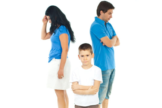 Upset boy between parents problems