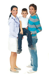 Mother and father carrying boy