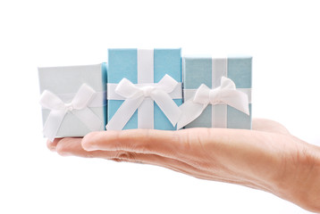 Hand with Three Ring Gift Boxes