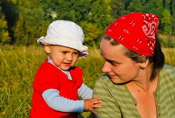 Mother and daughter outdoors
