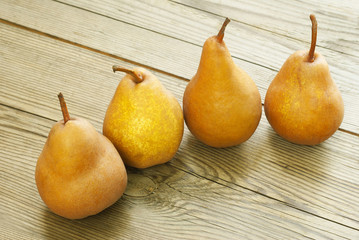 pears on wooden table