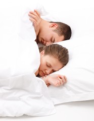Obraz na płótnie Canvas Man and women sleeping in bed