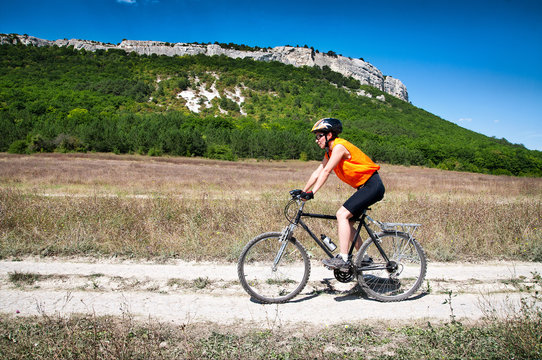 girl rides a bicycle