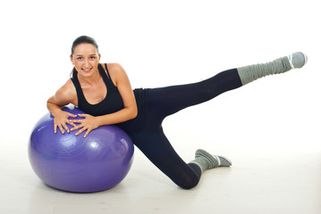 Fototapeta na wymiar Woman doing exercises for legs
