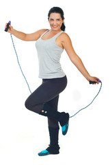 Happy woman with jump rope