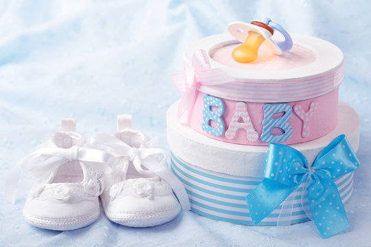 Little baby booties and gift boxes