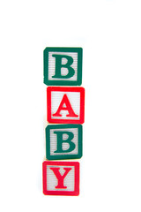 Tower of Baby Blocks in christmas colours isolated on white