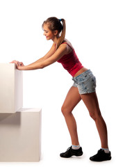 young girl rests on a light table