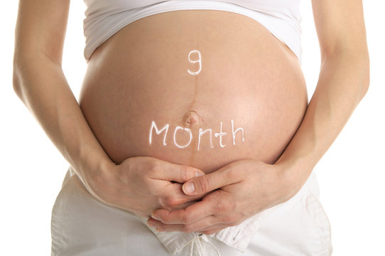 stomachs  with the inscription "9 month "