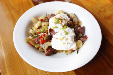 Corned beef hash with poached eggs.