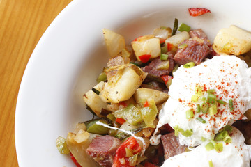 Corned beef hash with poached eggs.