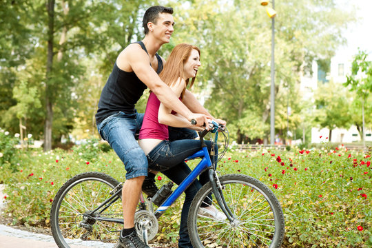 young couple on bike