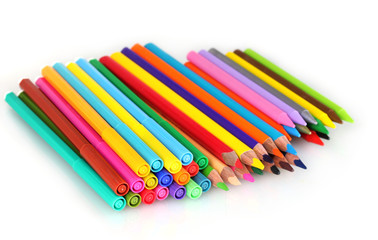 Fototapeta premium Bright markers and crayons isolated on white