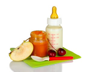 baby food and fruit isolated on white
