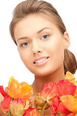 Fototapeta premium lovely woman with red flowers