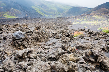 lava rocks close up on volcano slope of Etna