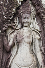 Fototapeta na wymiar Kobieta wyrze¼bione w świątyni w Angkor