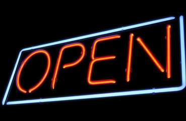 Open neon sign by night