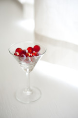 cocktail glass with red marble