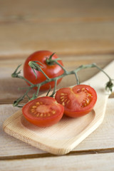 Tomatoes in a wooden spoon