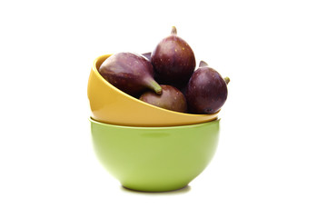 Fresh ripe figs in color cups.