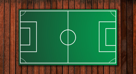 Fototapeta premium football tactical board on wooden floor