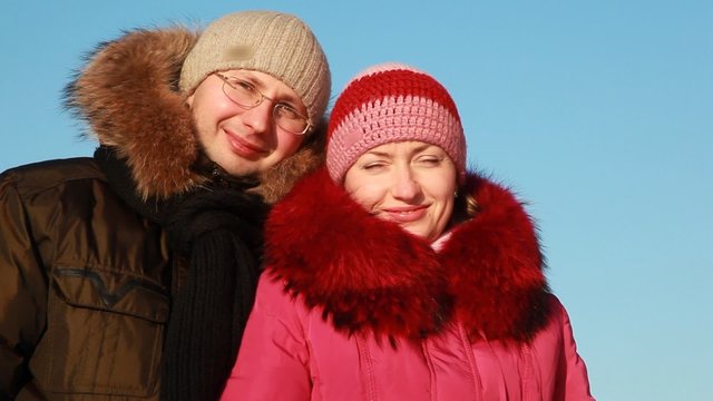 Woman and man at winter outdoors