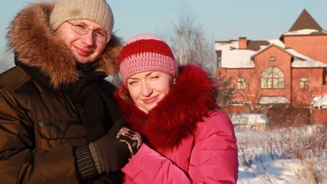 Woman and man at winter outdoors