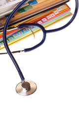 books and stethoscope isolated