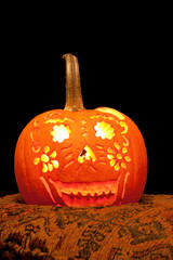 Smiling Jack O' Lantern with Candle Lit.