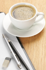 Clipboard and coffee