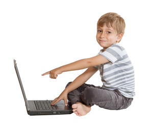 Boy with laptop isolated on white background