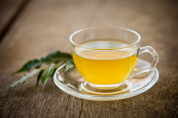 Green tea in glass cup
