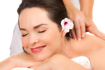 Obraz na płótnie Canvas Beautiful woman enjoying a massage