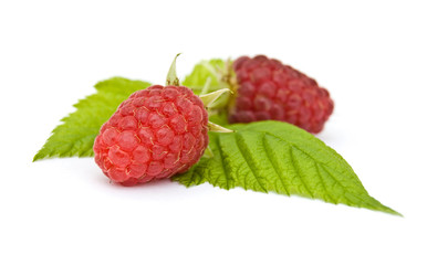 Fresh, ripe raspberries on white