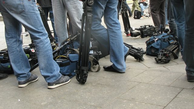Legs of  cameramen
